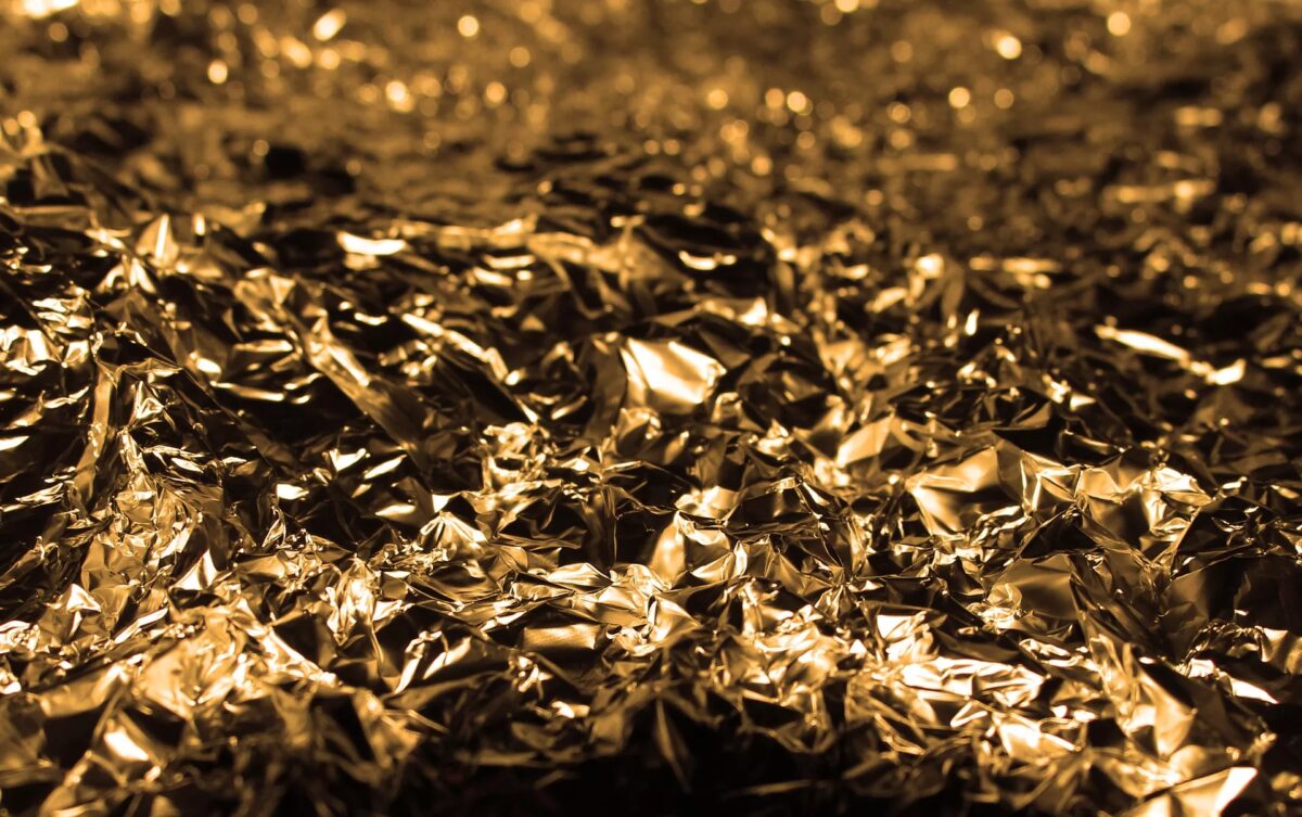 Ouro recua pressionado por alta de juros dos Treasuries e valorização do dólar